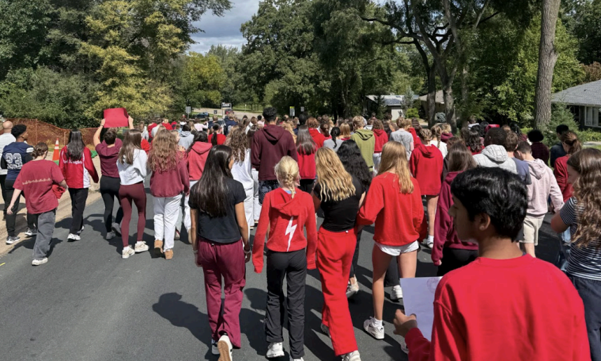 Breck students march in solidarity with students who have experienced gun violence throughout the country- Image by The Bugle