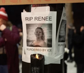 A sign visible at the vigil on January 7th.
Image from NBC News.