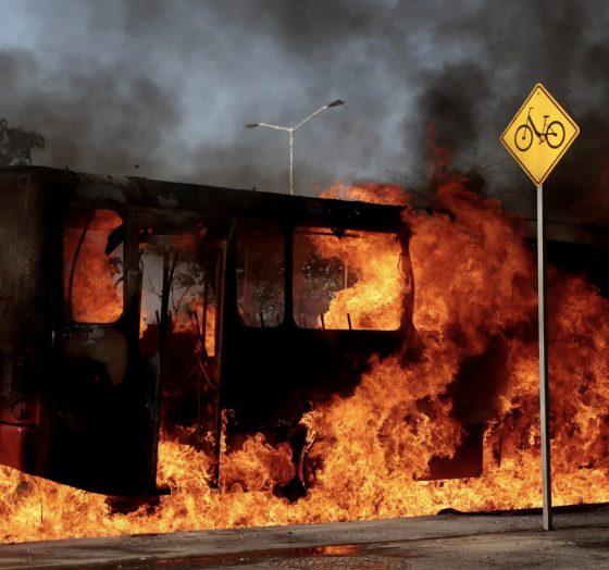 A bus set on fire in Zapopan, Mexico after El Mencho's death. Image credit New York Times.